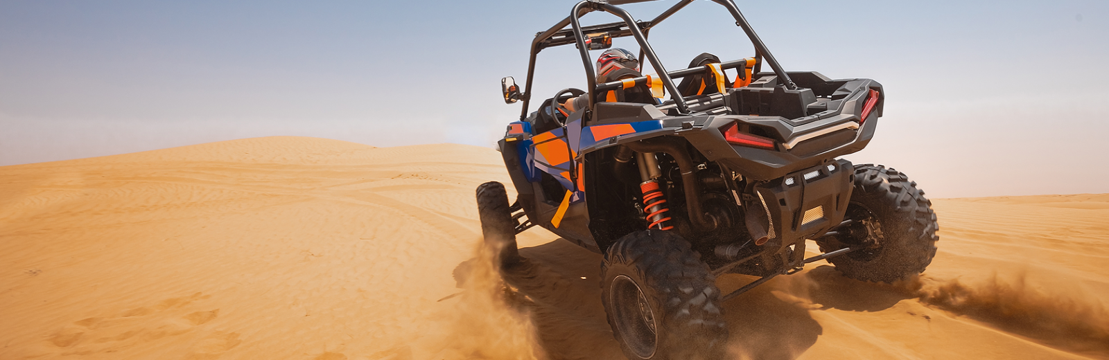 ATV driving through dessert