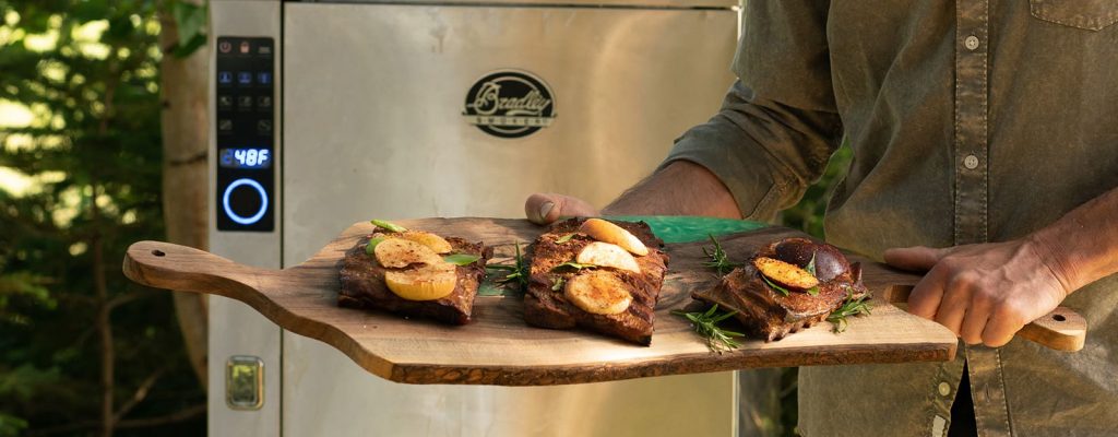 man holding tray of food