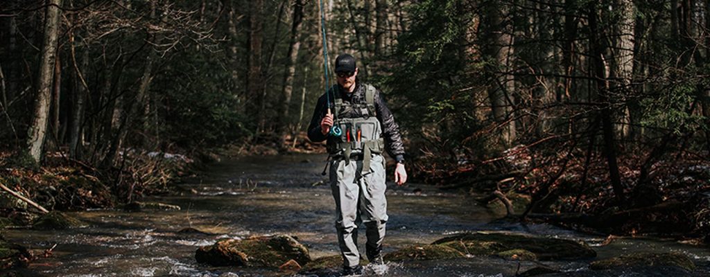 man with fishing pole