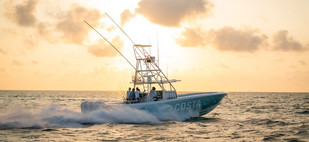 People out on a boat in the ocean.