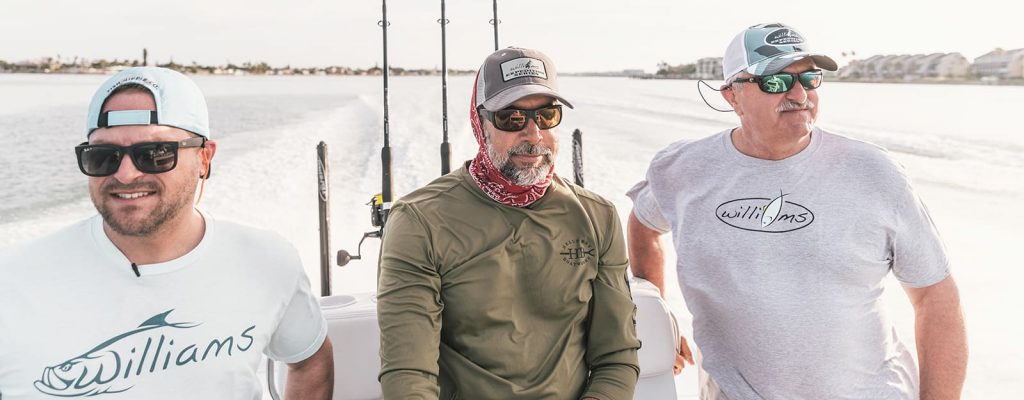 Men wearing Williams Knife Co shirts.