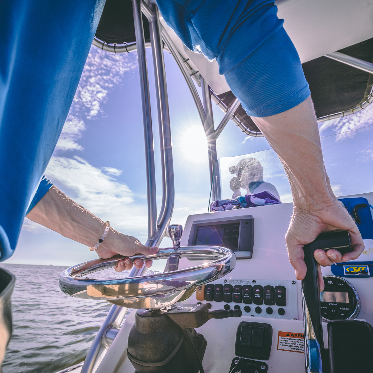 Watersports_Social Man operating boat