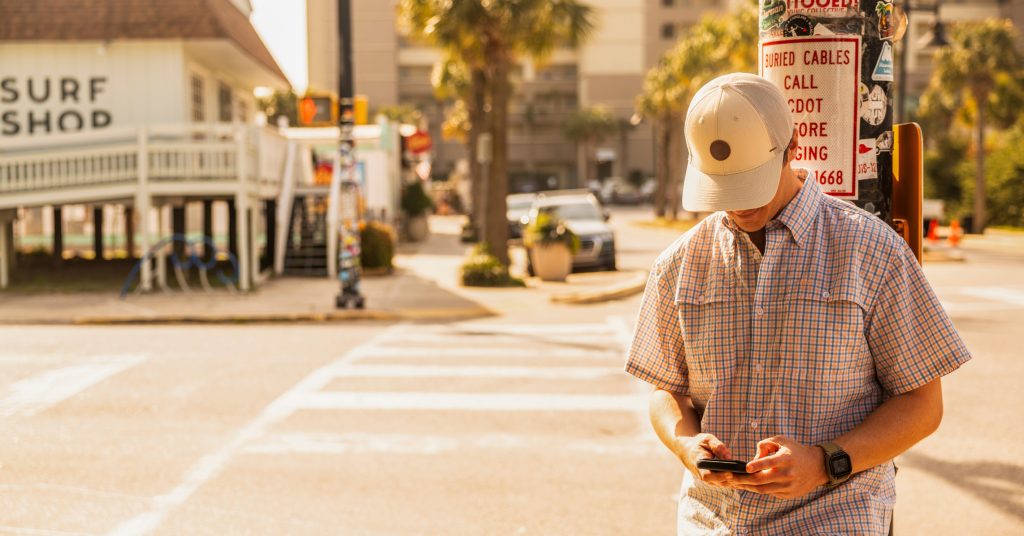 guy looking at phone