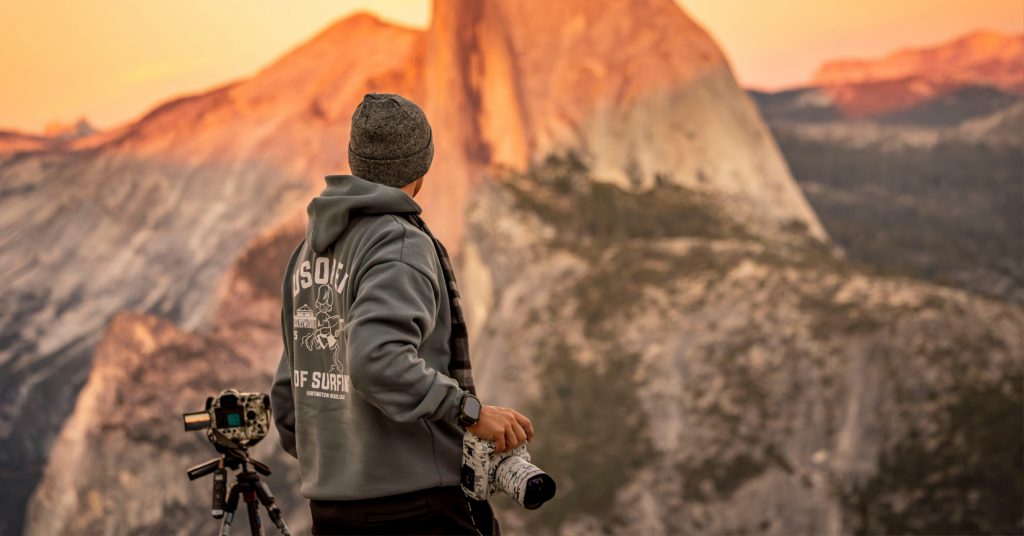 man shooting content